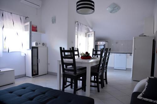 Kuchyň nebo kuchyňský kout v ubytování Apartman Melinda