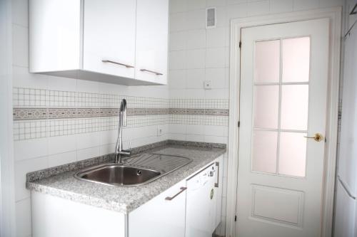 Kuchyňa alebo kuchynka v ubytovaní Apartamento Buhaira