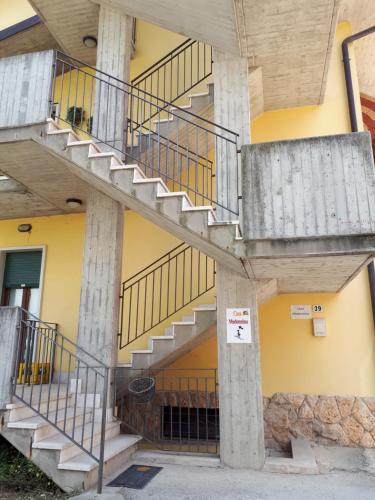 a building with stairs on the side of it at Casa Madonnina in Dossobuono