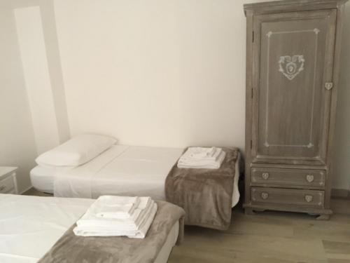 Una cama o camas en una habitación de Graffiti in Barbagia