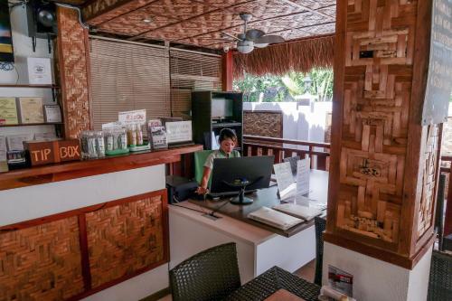 Televisyen dan/atau pusat hiburan di Scent of Green Papaya