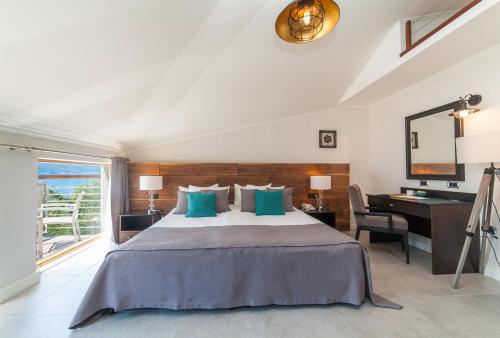Ένα ή περισσότερα κρεβάτια σε δωμάτιο στο Hotel Casa del Mare - Amfora