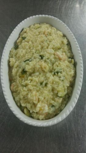 a white bowl of food with peas and rice at Agriturismo Vignavecchia in Vignacastrisi