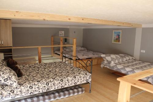 Posteľ alebo postele v izbe v ubytovaní Apartamenty Górskie