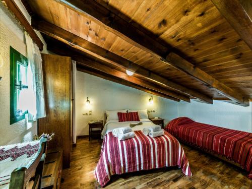 Postel nebo postele na pokoji v ubytování Villa Archanes