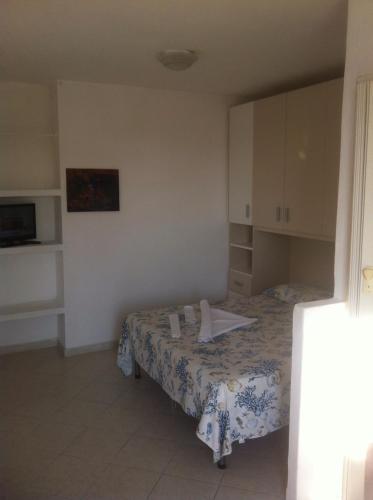 a room with a bed in a room at Casa vacanza in Ponza