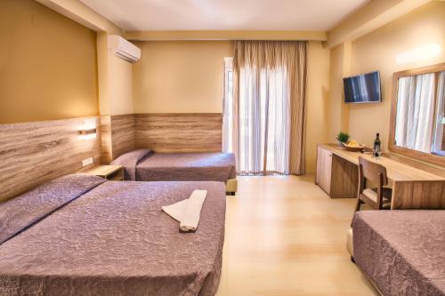 Sofia Hotel tesisinde bir odada yatak veya yataklar