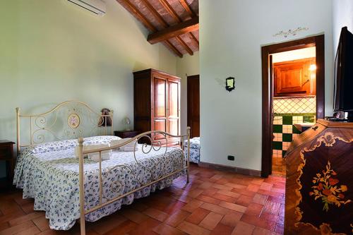 A bed or beds in a room at Il Collicello