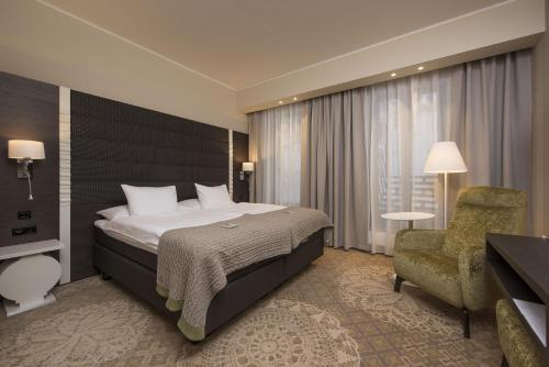 מיטה או מיטות בחדר ב-Lydia Hotel