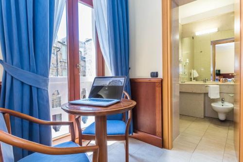 A bathroom at Hotel Duomo