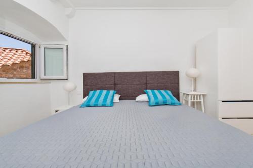 Posteľ alebo postele v izbe v ubytovaní Seagull Apartment