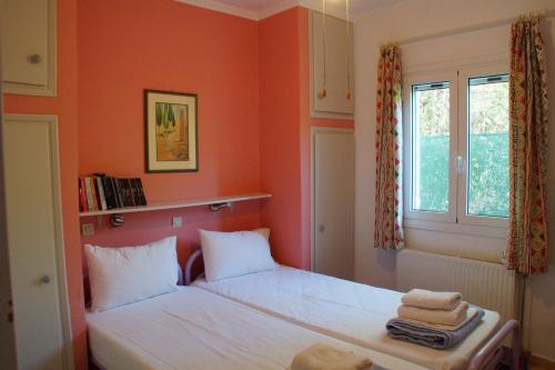 En eller flere senge i et værelse på Villa Goitia