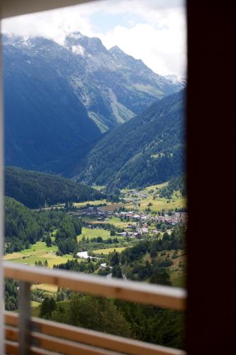 a view of a mountain valley from a window at Guarda Lodge in Guarda