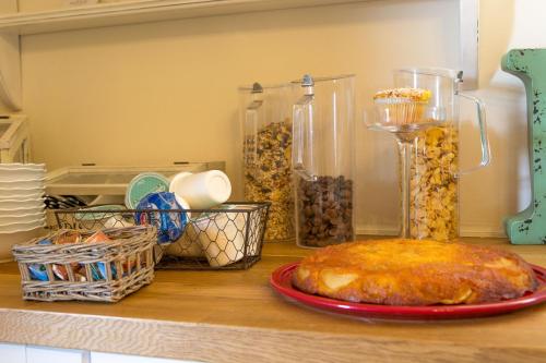 a table with a plate of food on a counter at Masseria Sorani in Manduria