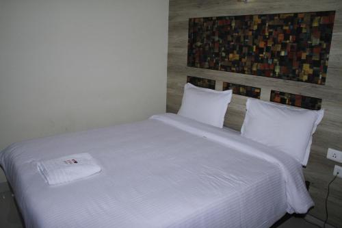 Jeyam Residencyにあるベッド