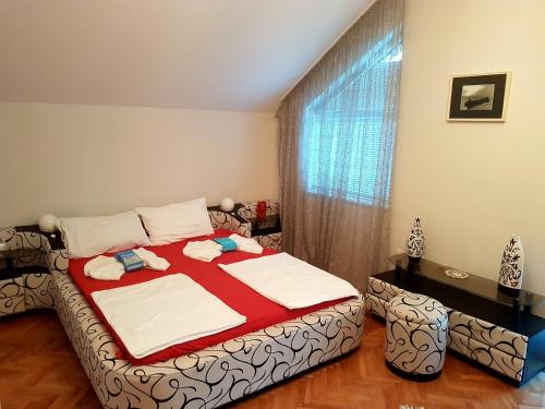 Postel nebo postele na pokoji v ubytování Apartment Cace