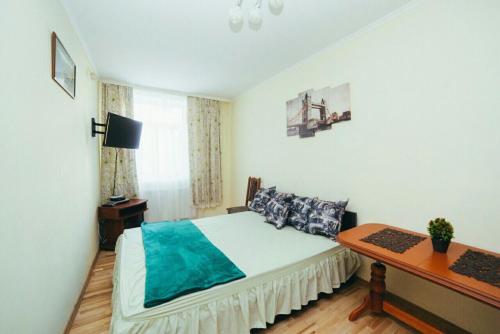 
Ліжко або ліжка в номері Apartment on Sichovyh Striltsiv
