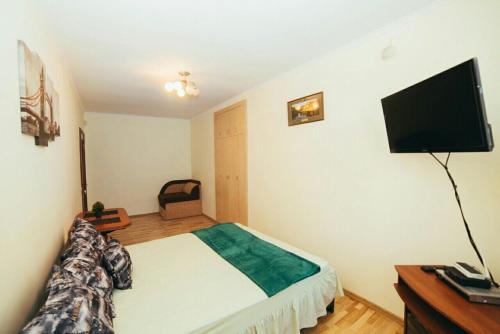 
Ліжко або ліжка в номері Apartment on Sichovyh Striltsiv
