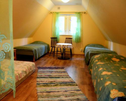 Roosi Camping Houses房間的床