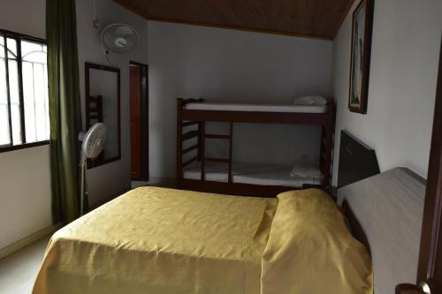 Uma cama ou camas num quarto em Hotel El Principe