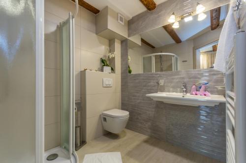 Ванна кімната в Minella Residence