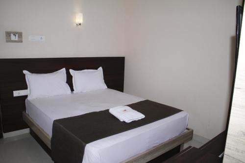 Jeyam Residencyにあるベッド