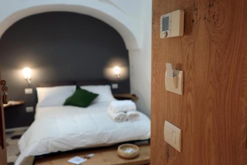 Cama o camas de una habitación en FONTEblu B&B