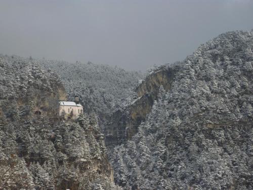 a building on the side of a mountain at Hotel Tyrolis in Zirl