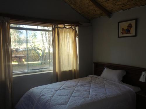 Postel nebo postele na pokoji v ubytování La Casa de Santiago Hotel