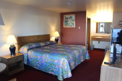 מיטה או מיטות בחדר ב-Silver Sands Motel