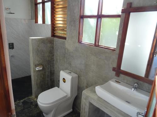 Koupelna v ubytování Nelu Villa Sigiriya