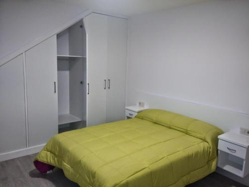 Cama o camas de una habitación en Vivienda de uso turístico FINISTERRAE MAR