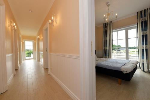 Llit o llits en una habitació de Vila Bianca