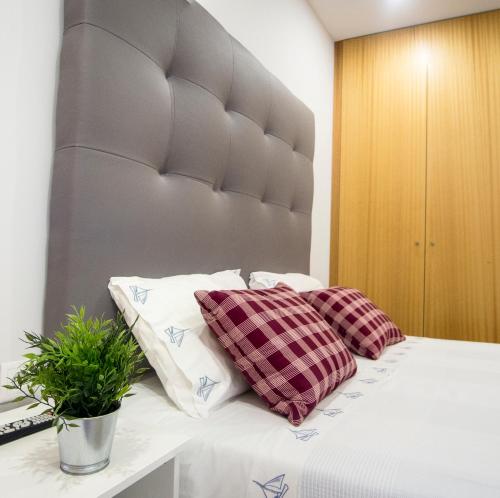 Ένα ή περισσότερα κρεβάτια σε δωμάτιο στο SUITE T1 Junto ao Mar