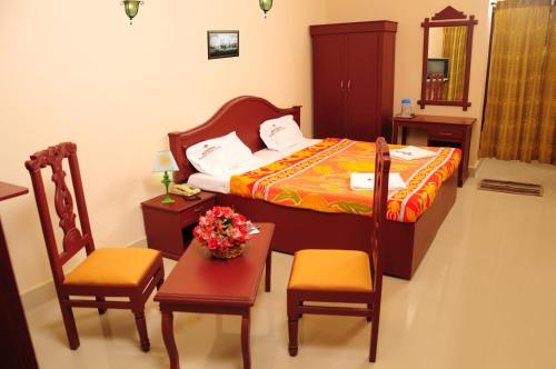Postel nebo postele na pokoji v ubytování Hotel Nuhman