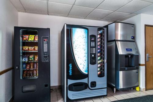 a large vending machine next to a refrigerator at Motel 6-Libertyville, IL in Libertyville
