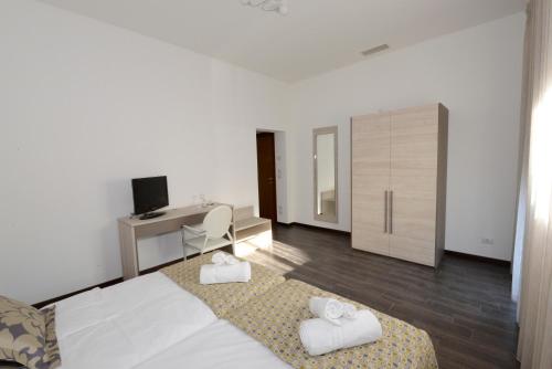 A bed or beds in a room at BB Venice Cinzias'