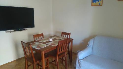 Un televizor și/sau centru de divertisment la Apartment Quiet Getaway