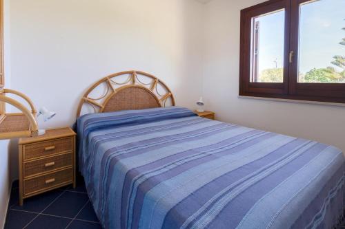 Postel nebo postele na pokoji v ubytování Le Casette a Favignana
