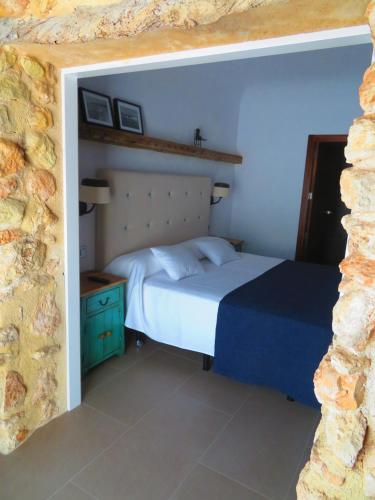 Postel nebo postele na pokoji v ubytování HOTEL MAÑET