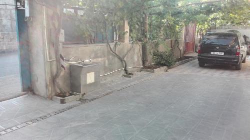 a car parked on the side of a street at Karine B&B in Yeghegnadzor