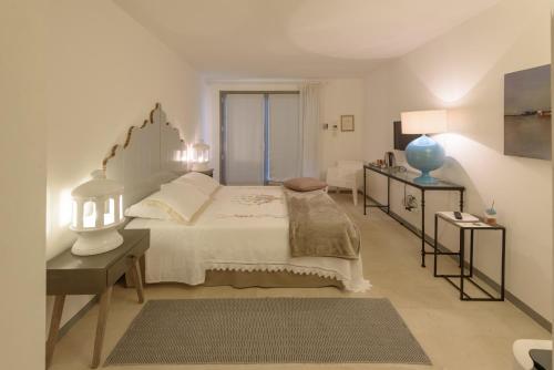 Palazzo Dei Dondoli tesisinde bir odada yatak veya yataklar