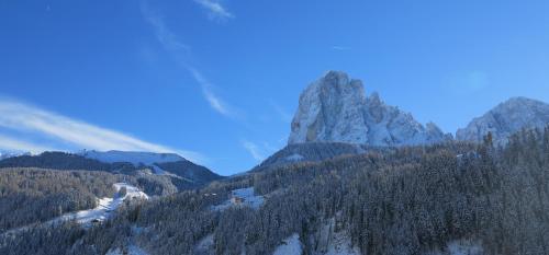 a view of a mountain with snow on it at Garni Cir in Santa Cristina in Val Gardena