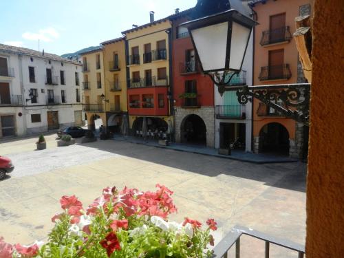 a view from a window of a street with buildings at Ca de Géraldine in El Pont de Suert