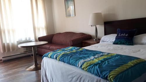 Ένα ή περισσότερα κρεβάτια σε δωμάτιο στο All Tucked Inn