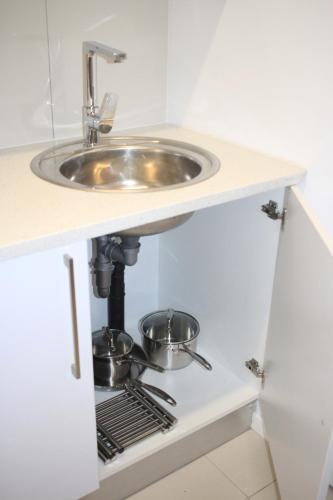 Cuina o zona de cuina de Tower Bliss Apartment