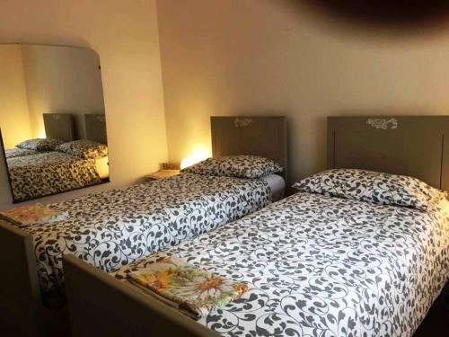 Tempat tidur dalam kamar di Casa Vacanze Casuglie