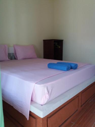 Кровать или кровати в номере Melbao Homestay