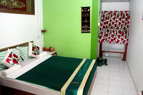Cama o camas de una habitación en Garden Guesthouse