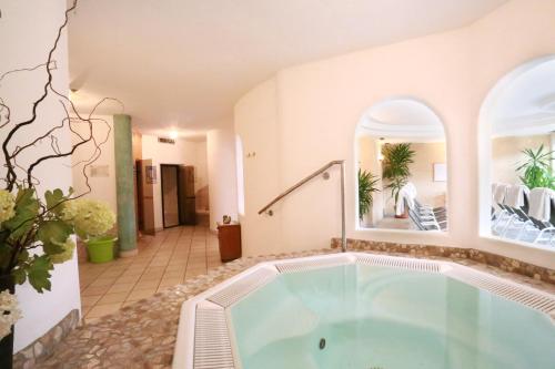 a jacuzzi tub in a house at Hotel Ploseblick in Natz-Schabs